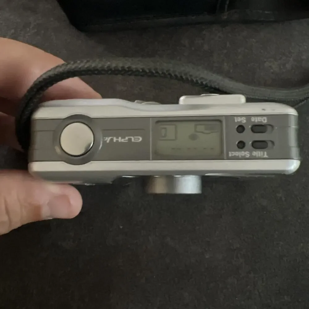 Canon Elph Jr Handheld Built-in Flash 26mm APS Film Camera With Battery Included